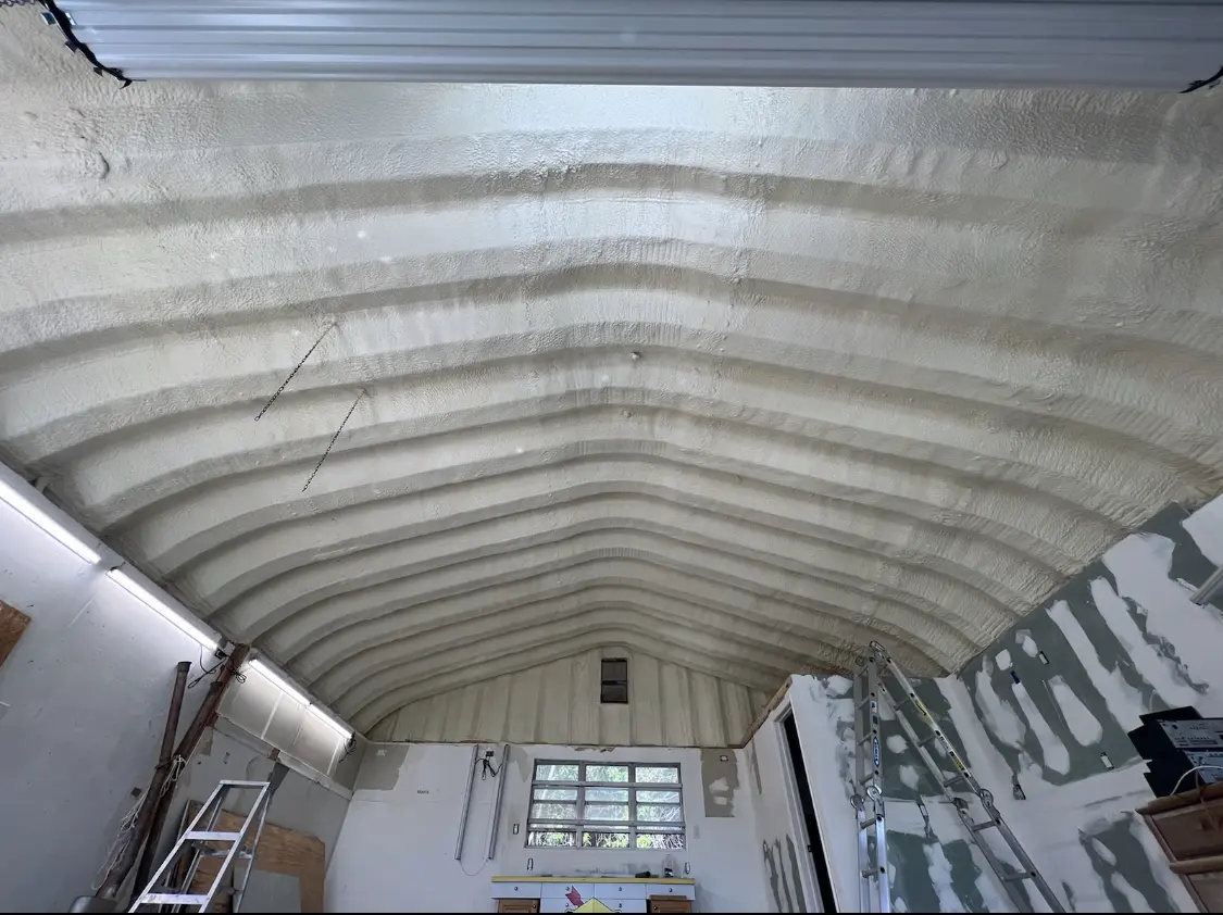 Spray polyurethane foam applied to the underside of a metal roof deck in Palatka